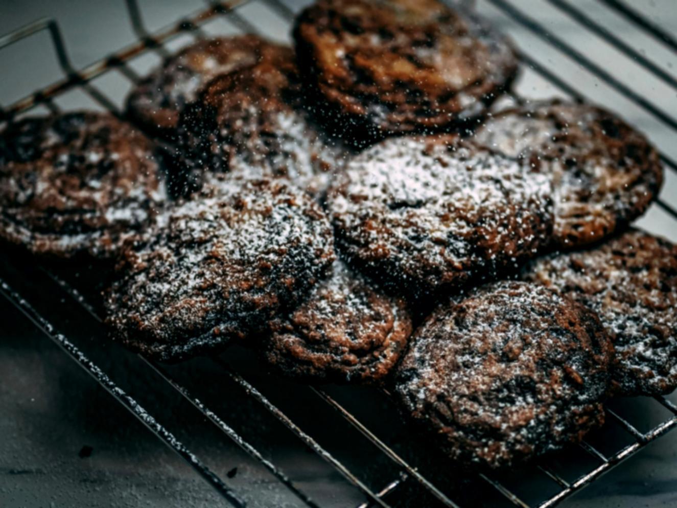 Close-up of freshly prepared pizza dough being stretched by hand